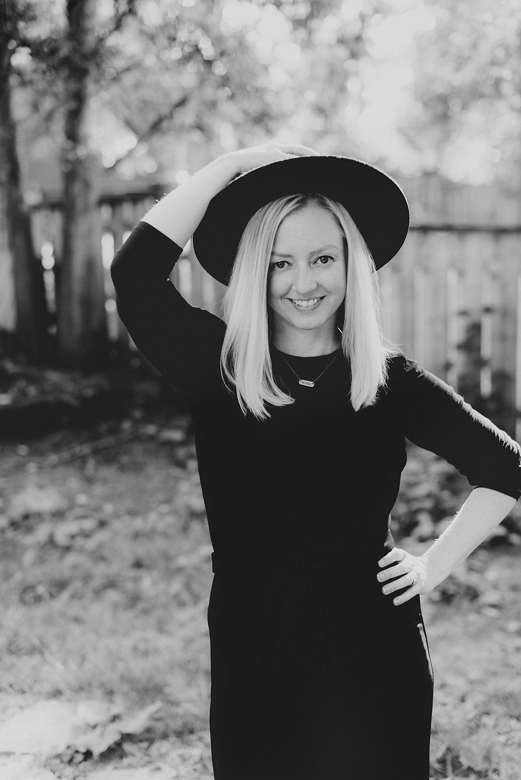 Robyn Pineault wearing a black hat